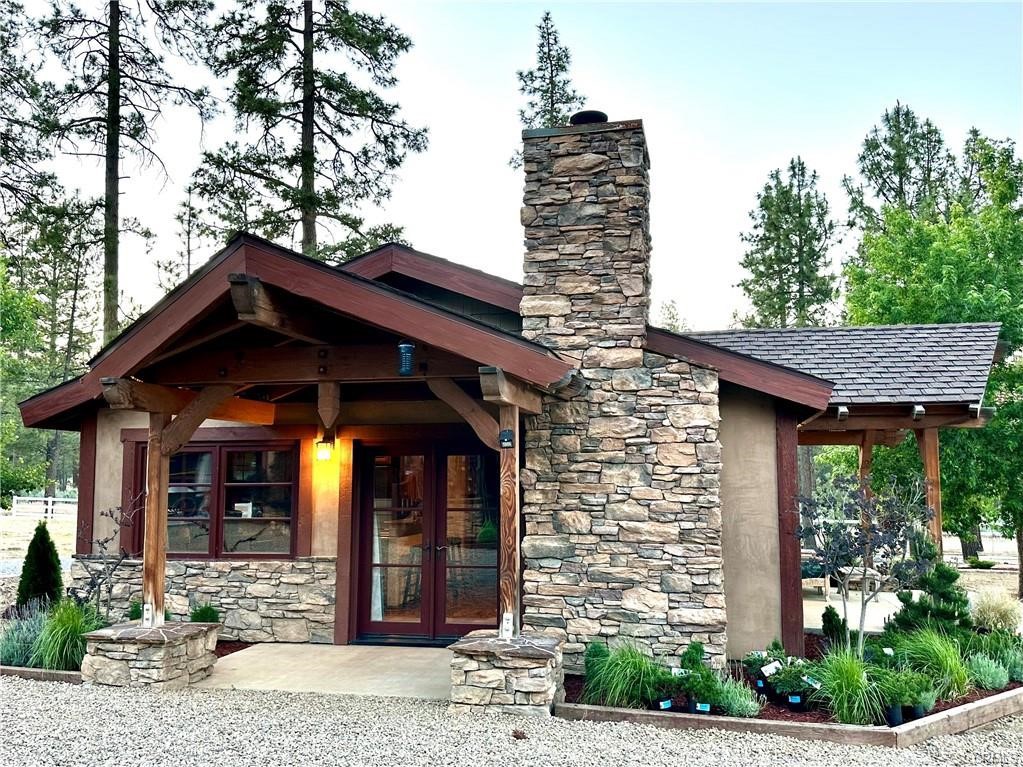 35650 Pyramid Peak Road Mountain Center, CA 92561 - Photo 3 of 24 a front view of a house with garden