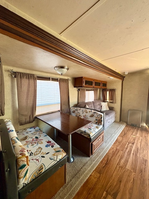 5-308 Woodhaven Sublette, IL 61367 - Photo 12 of 30 a living room with furniture and a wooden floor