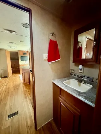 a bathroom with a sink and a mirror