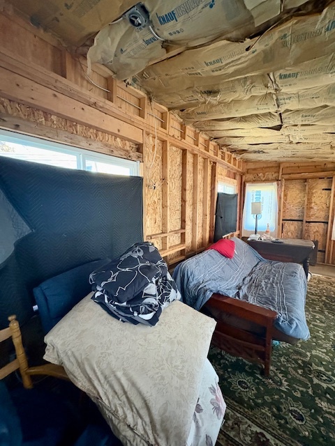 5-308 Woodhaven Sublette, IL 61367 - Photo 26 of 30 a bed sitting in a bedroom next to a window