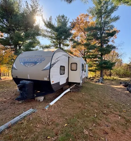 a sign that is sitting in front of a house