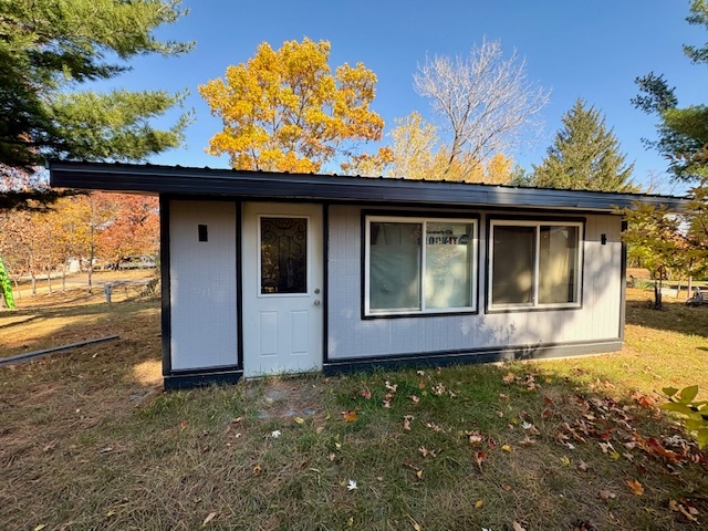 5-308 Woodhaven Sublette, IL 61367 - Photo 7 of 30 a front view of a house with a yard