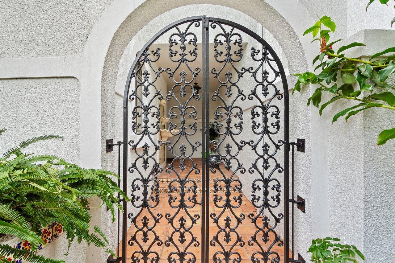 5580 North Ocean Boulevard, Unit 29F Ocean Ridge, FL 33435 - Photo 9 of 62 Closed Courtyard Gate