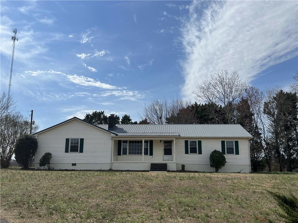 907 Sosbee Road Talmo, GA 30575 - Photo 1 of 1 a view of a house with a yard