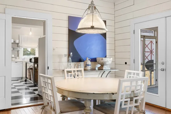 a shelf with books and knick knacks on it