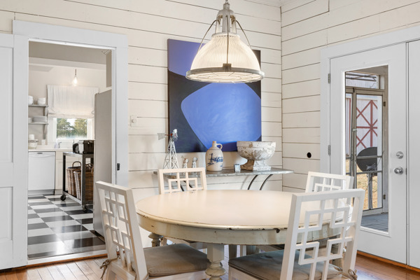6020 Valley View Lane Brenham, TX 77833 - Photo 12 of 29 a view of a dining room with furniture and wooden floor