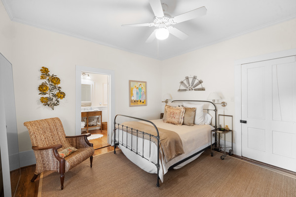 6020 Valley View Lane Brenham, TX 77833 - Photo 17 of 29 a bedroom with a bed and a chair