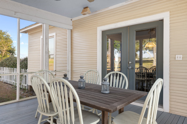 6020 Valley View Lane Brenham, TX 77833 - Photo 25 of 29 a view of a dining room with furniture window and wooden floor