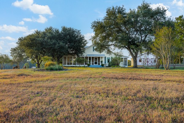 6020 Valley View Lane Brenham, TX 77833 - Photo 4 of 29 a front view of house with yard and green space