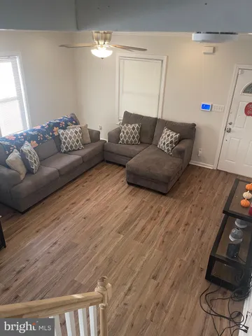 a living room with furniture and a couch