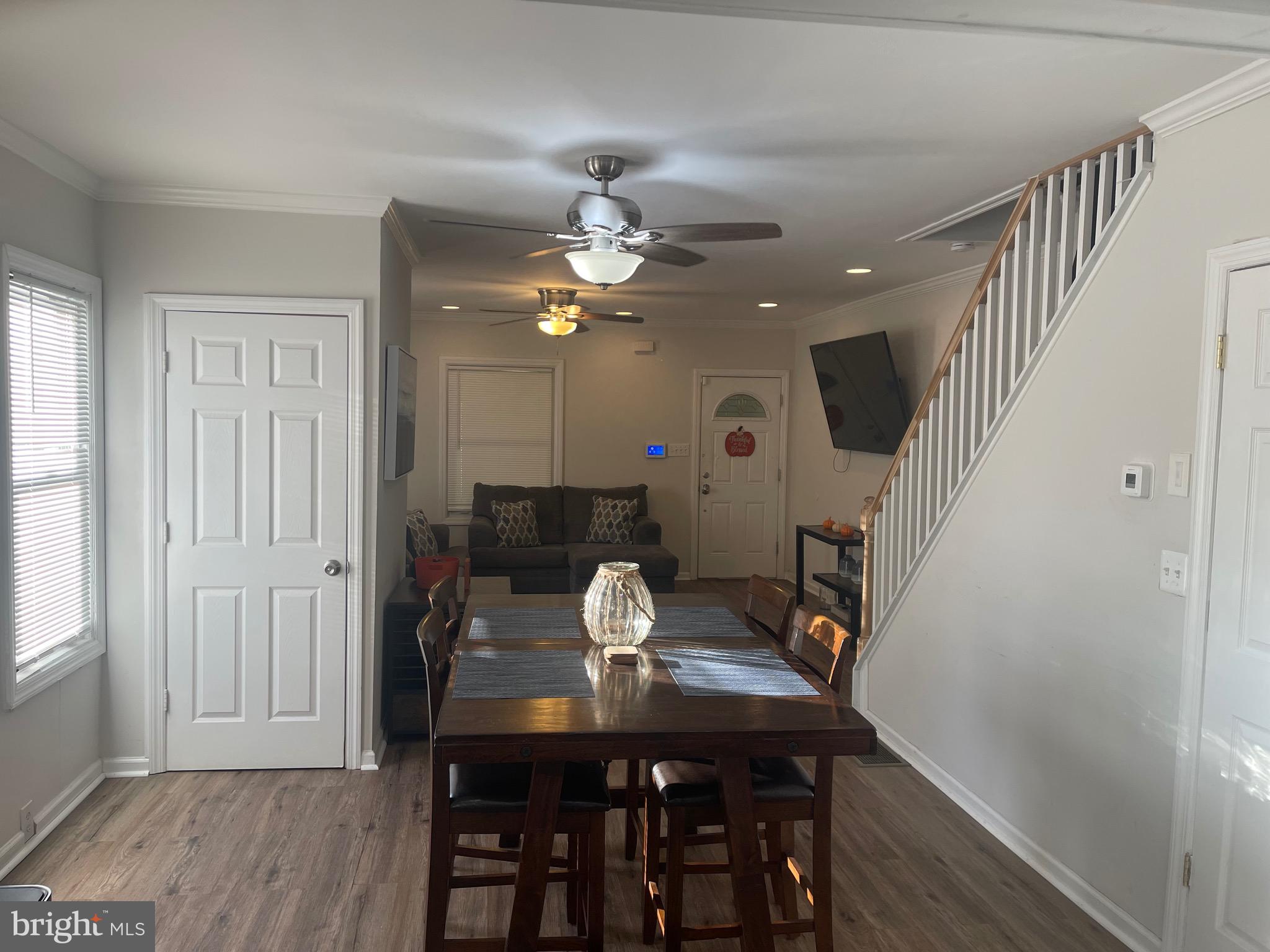 323 High Street Westville, NJ 08093 - Photo 15 of 33 a view of a dining room with furniture and wooden floor