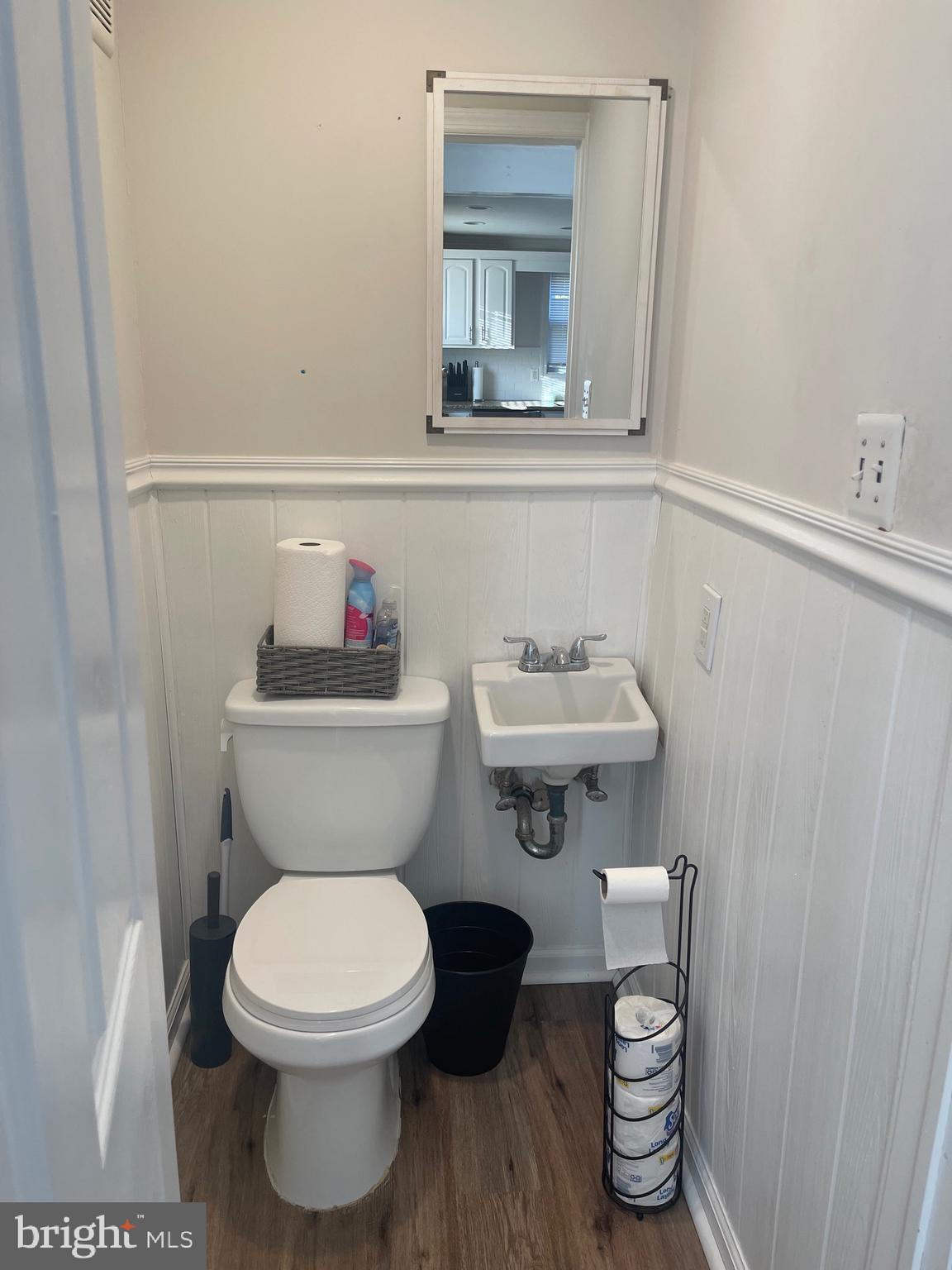 323 High Street Westville, NJ 08093 - Photo 19 of 33 a bathroom with a toilet and a sink