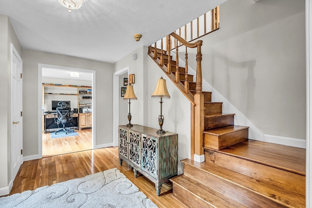 26 Wilder Road Sterling, MA 01564 - Photo 11 of 28 a living room with furniture and a rug