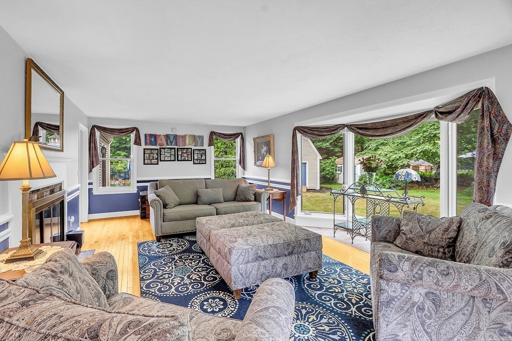 26 Wilder Road Sterling, MA 01564 - Photo 12 of 28 a living room with furniture and a large window