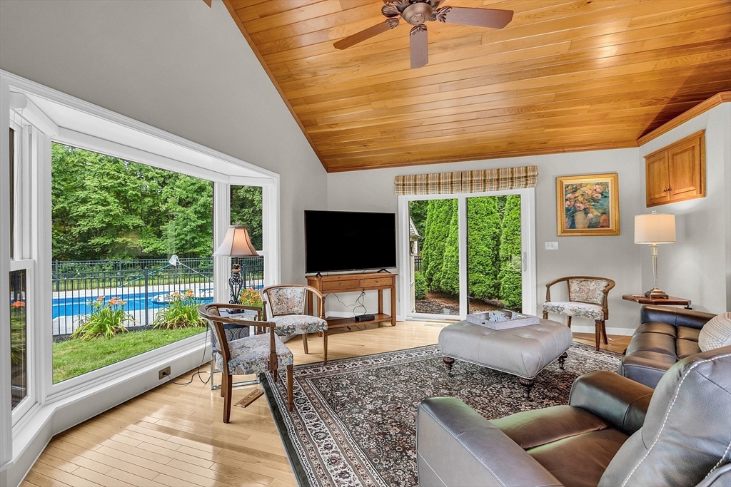 26 Wilder Road Sterling, MA 01564 - Photo 15 of 28 a living room with furniture and a flat screen tv
