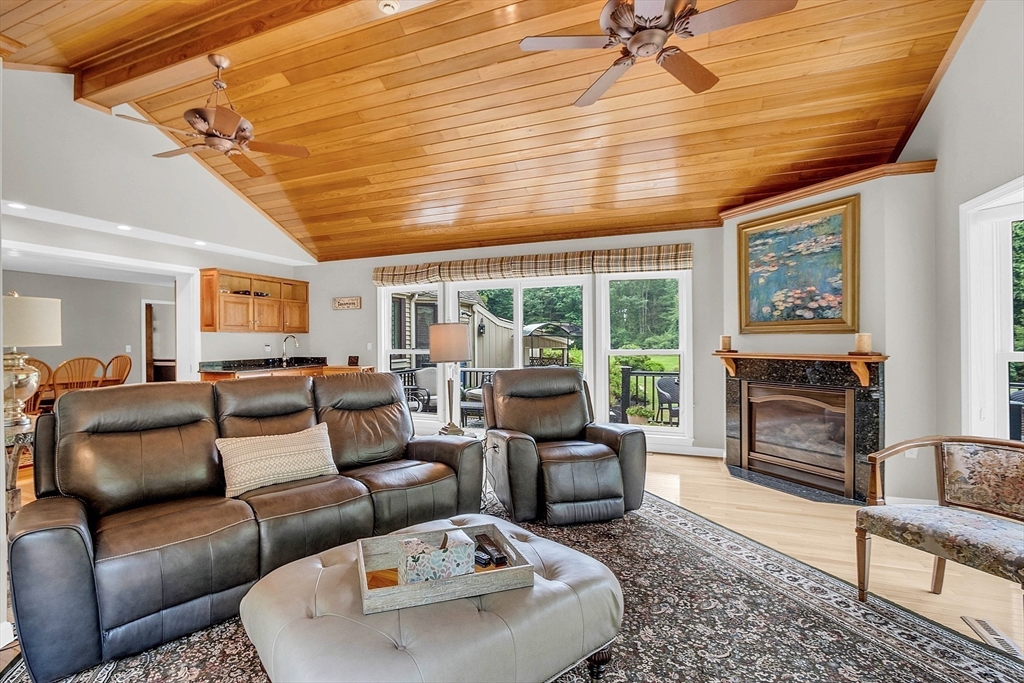 26 Wilder Road Sterling, MA 01564 - Photo 17 of 28 a living room with furniture and a fireplace