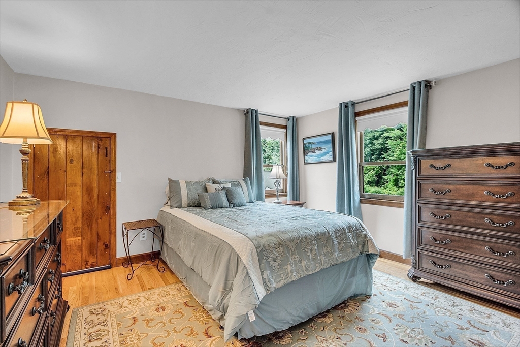 26 Wilder Road Sterling, MA 01564 - Photo 19 of 28 a bedroom with a bed and a dresser