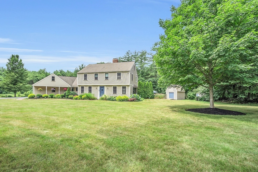 26 Wilder Road Sterling, MA 01564 - Photo 27 of 28 a view of a big house with a big yard