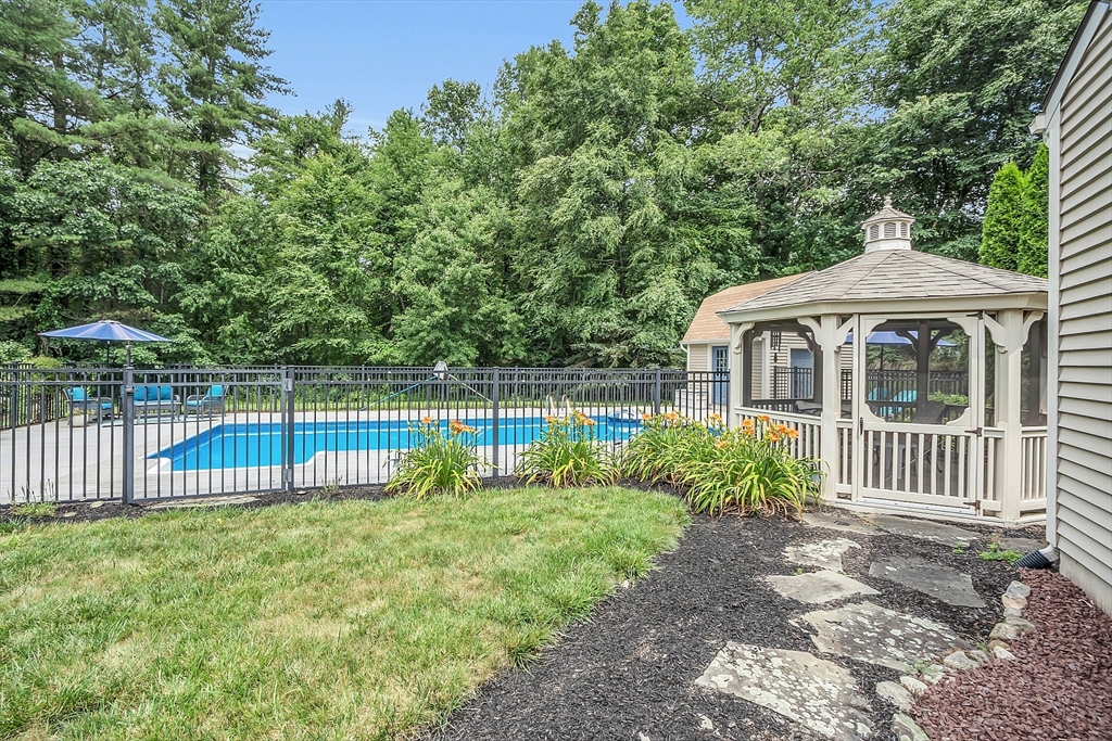 26 Wilder Road Sterling, MA 01564 - Photo 4 of 28 a view of a deck with a fence and a bench