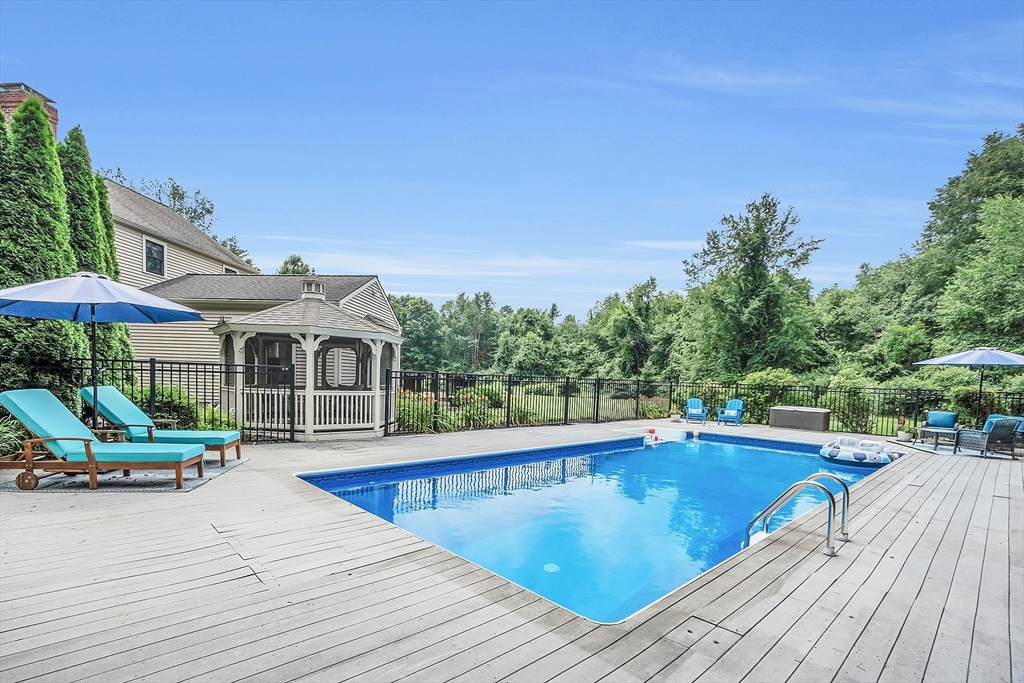 26 Wilder Road Sterling, MA 01564 - Photo 5 of 28 a view of a swimming pool with a patio
