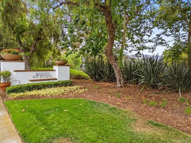 a sign broad in front of a building