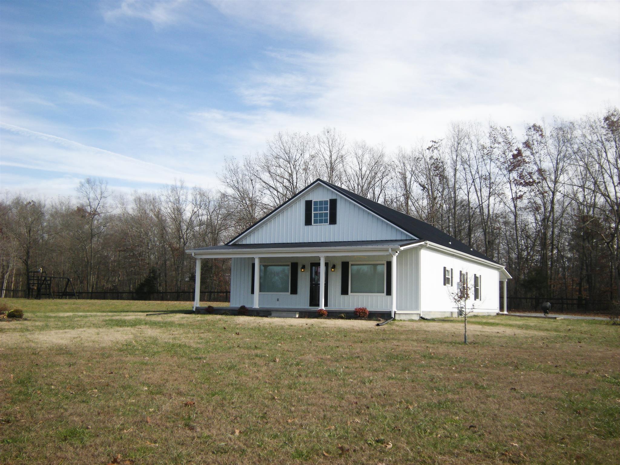 2798 Eugene Reed Road Woodbury, TN 37190 - Photo 1 of 25 COUNTRY: PURE AND SIMPLE! Plenty of space to grow on 6.49 acres with pond.
