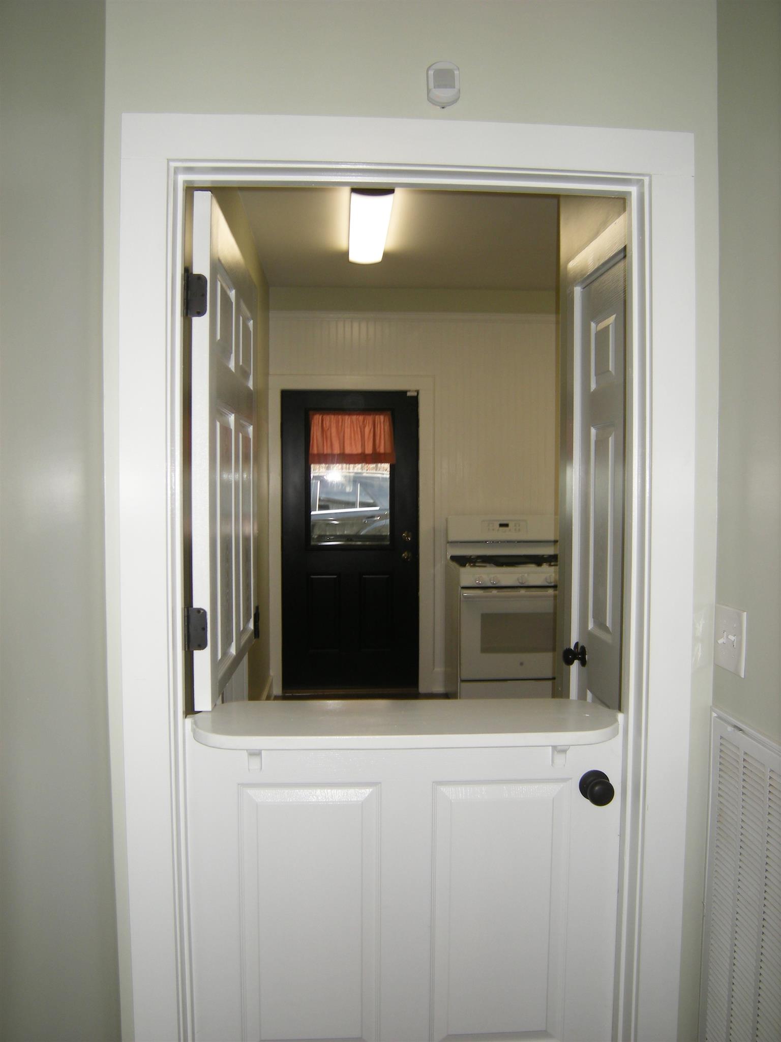 2798 Eugene Reed Road Woodbury, TN 37190 - Photo 16 of 25 Dutch door leading to summer kitchen/ utility room.