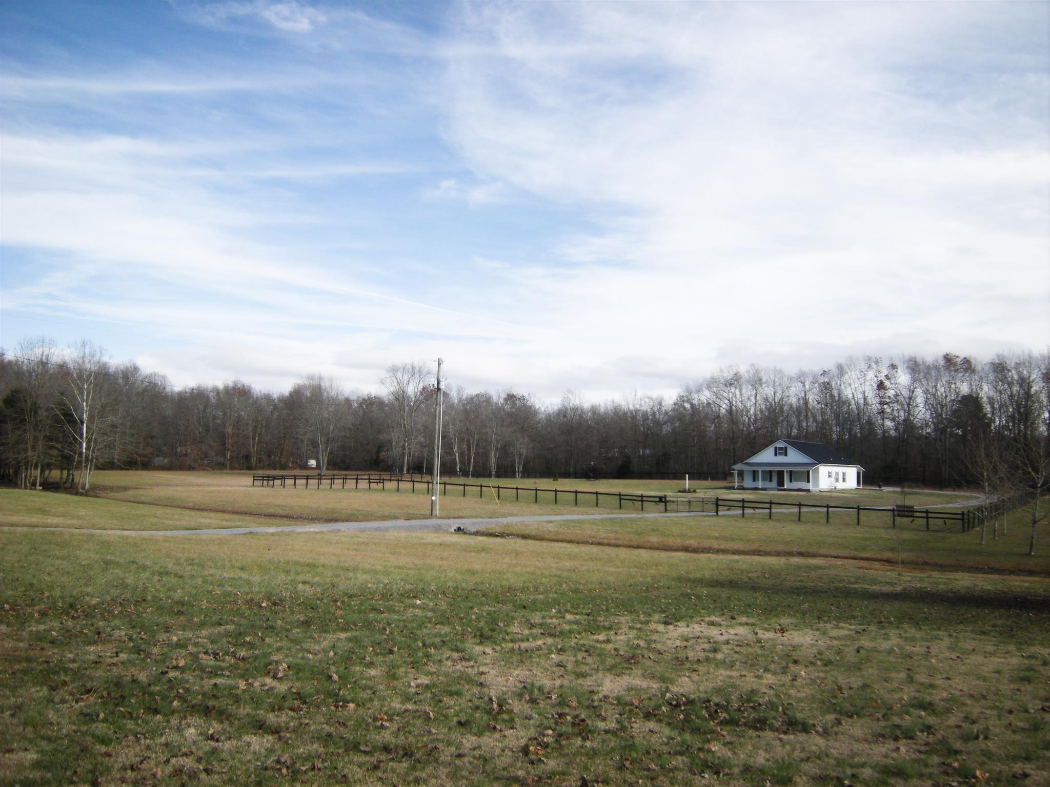 2798 Eugene Reed Road Woodbury, TN 37190 - Photo 2 of 25 About 2 acres around your new home is fenced and there is an automatic gate for privacy.