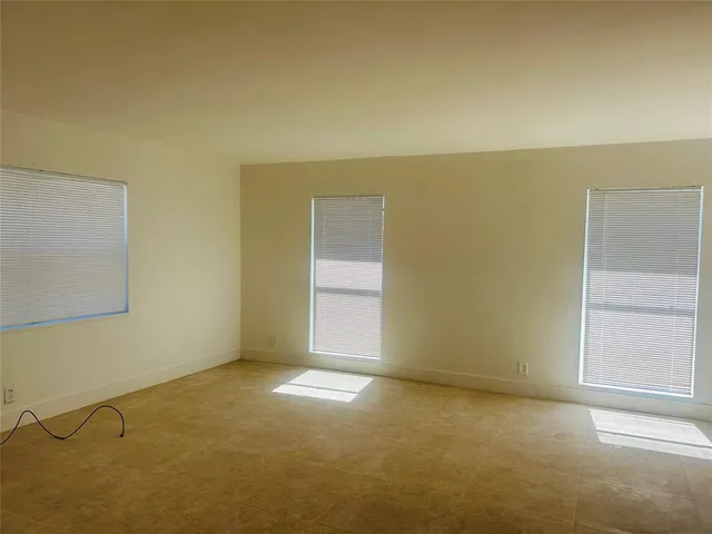 a house with swimming pool in front of it