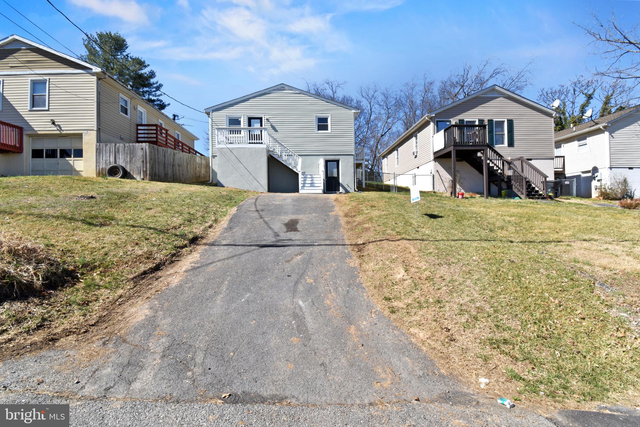 620 B Street Staunton, VA 24401 - Photo 21 of 26 a front view of a house with a yard