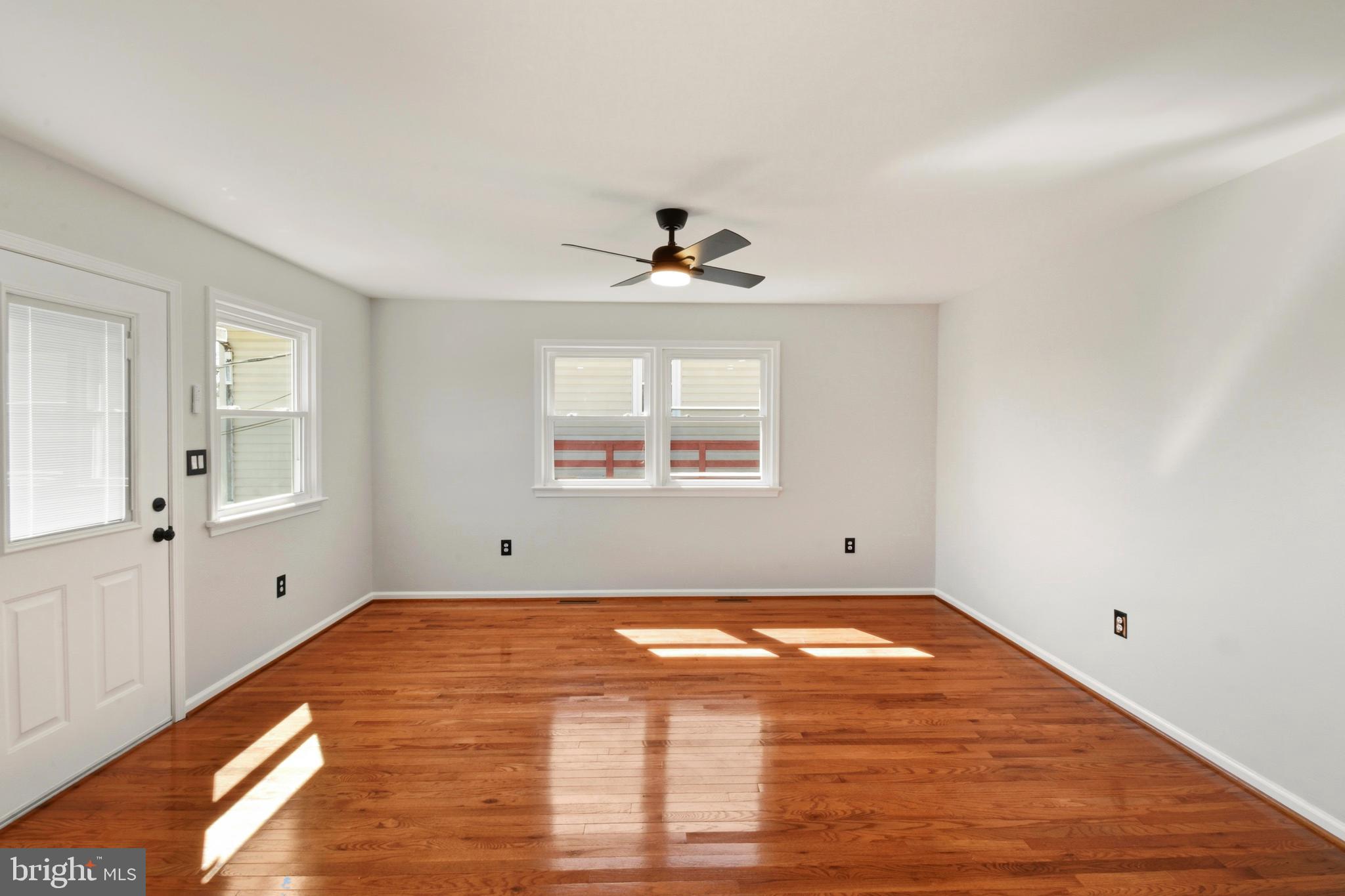 620 B Street Staunton, VA 24401 - Photo 5 of 26 a view of empty room with wooden floor and fan
