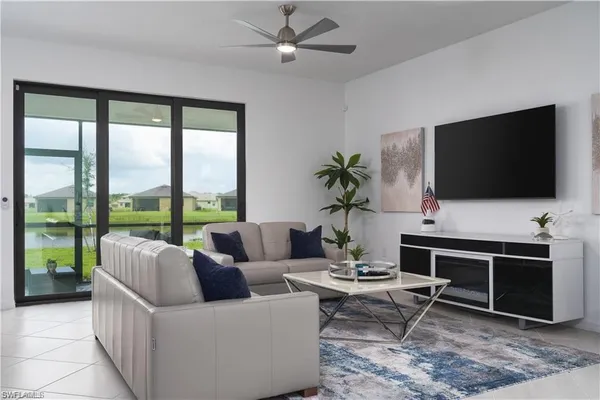 a bedroom with a bed dresser and a window