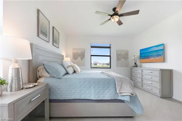 a view of a workspace with furniture and a potted plant