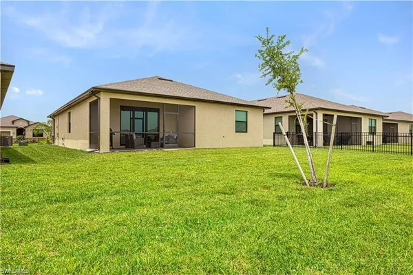 a front view of a house with yard