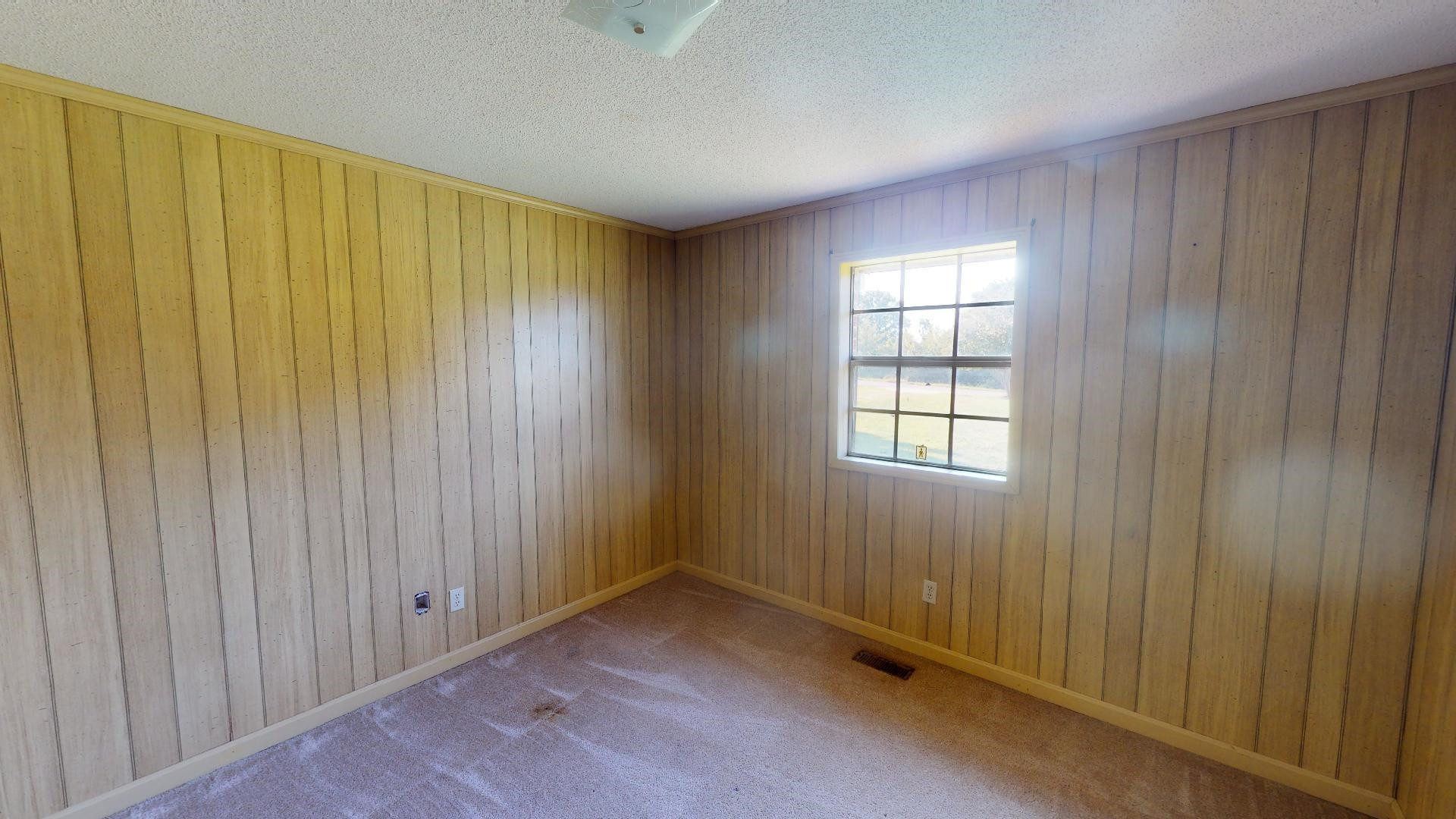 296 Enochs Road Newbern, TN 38059 - Photo 7 of 14 an empty room with windows