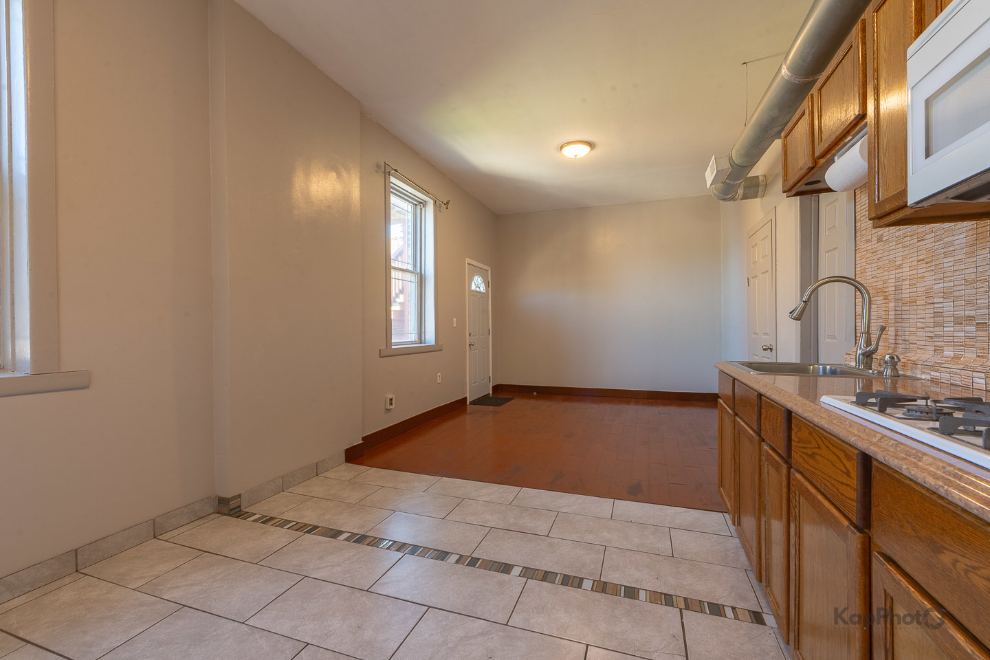 2504 South Blue Island Avenue, Unit 1R Chicago, IL 60608 - Photo 11 of 31 a view of a kitchen with a sink and cabinets