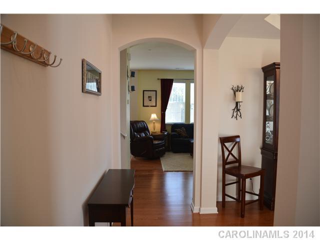 6533 Del Rio Road Charlotte, NC 28277 - Photo 5 of 15 a living room with furniture and a wooden floor