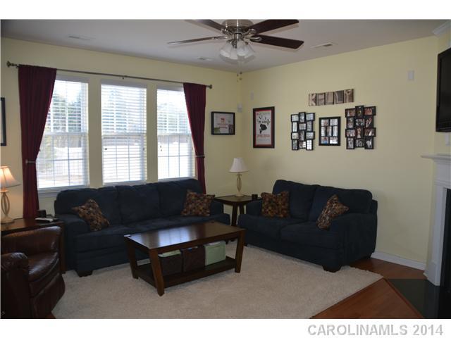 6533 Del Rio Road Charlotte, NC 28277 - Photo 6 of 15 a living room with furniture and a large window
