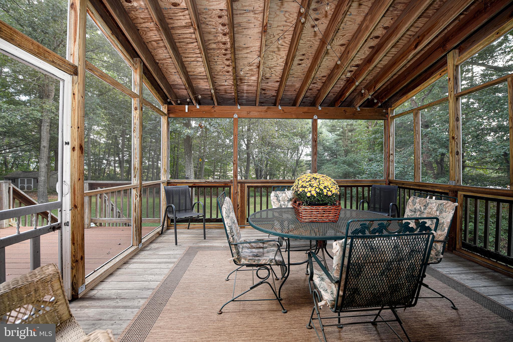 844 Stansbury Road Pylesville, MD 21132 - Photo 22 of 51 Screened in porch views
