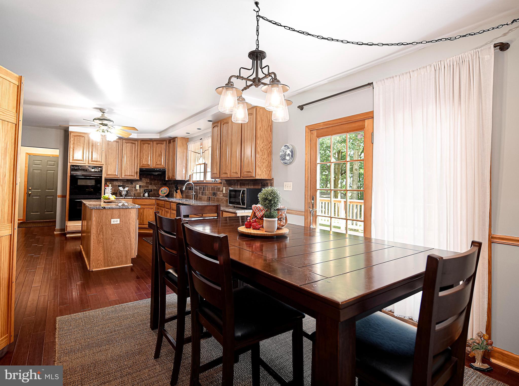 844 Stansbury Road Pylesville, MD 21132 - Photo 23 of 51 Kitchen provides access to huge deck