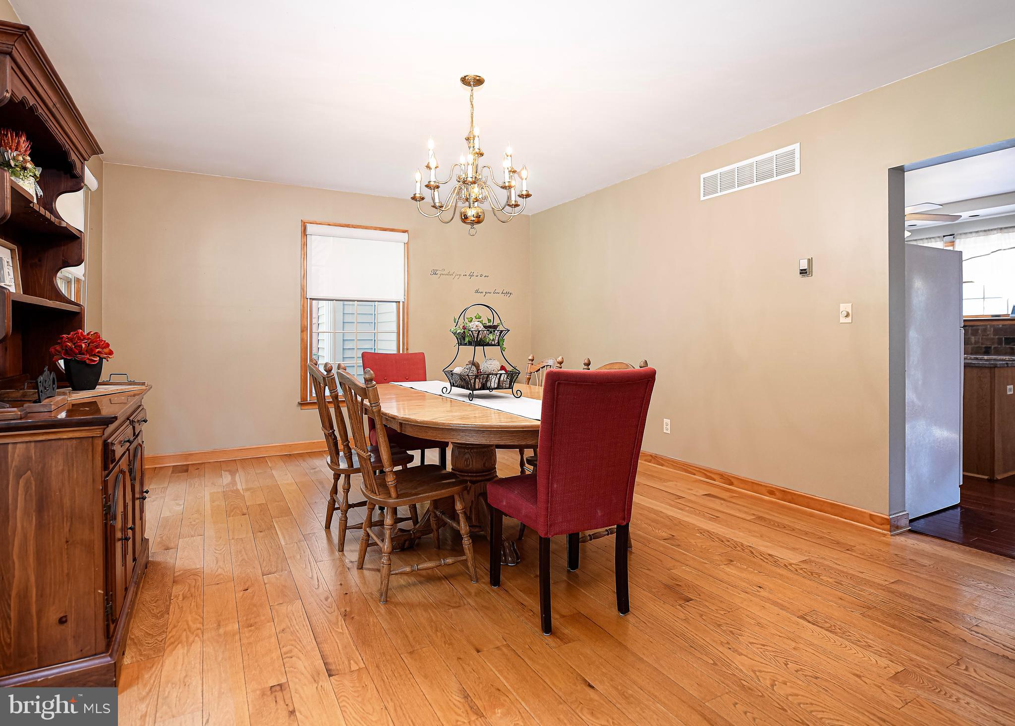 844 Stansbury Road Pylesville, MD 21132 - Photo 8 of 51 Light filled dining room w/ wide plank hdwd floors