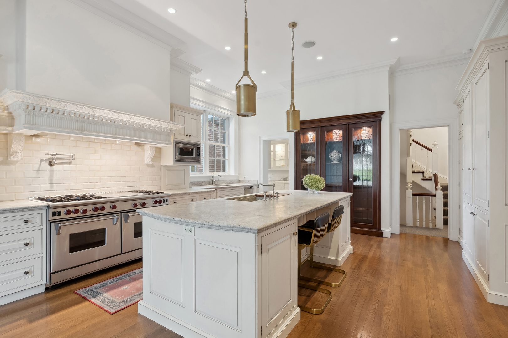 100 Pembroke Drive Lake Forest, IL 60045 - Photo 18 of 56 a kitchen with a stove and a sink