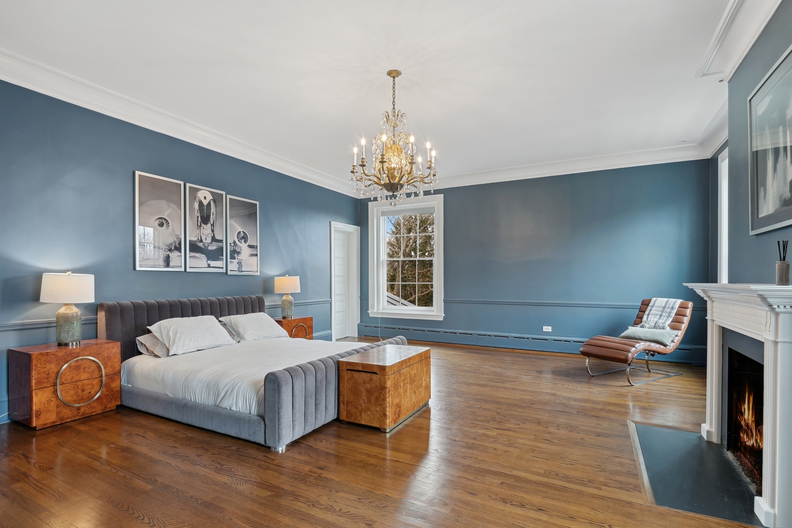 100 Pembroke Drive Lake Forest, IL 60045 - Photo 27 of 56 a bedroom with a bed and a chandelier