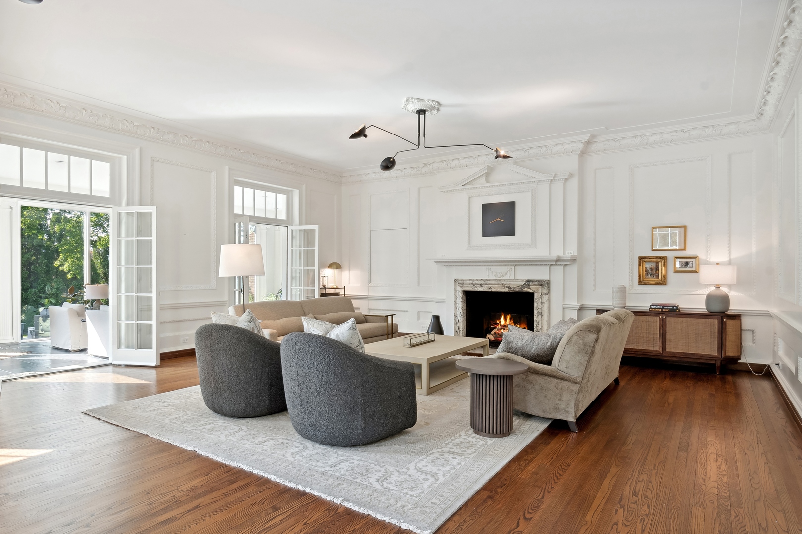 100 Pembroke Drive Lake Forest, IL 60045 - Photo 3 of 56 a living room with furniture and a fireplace