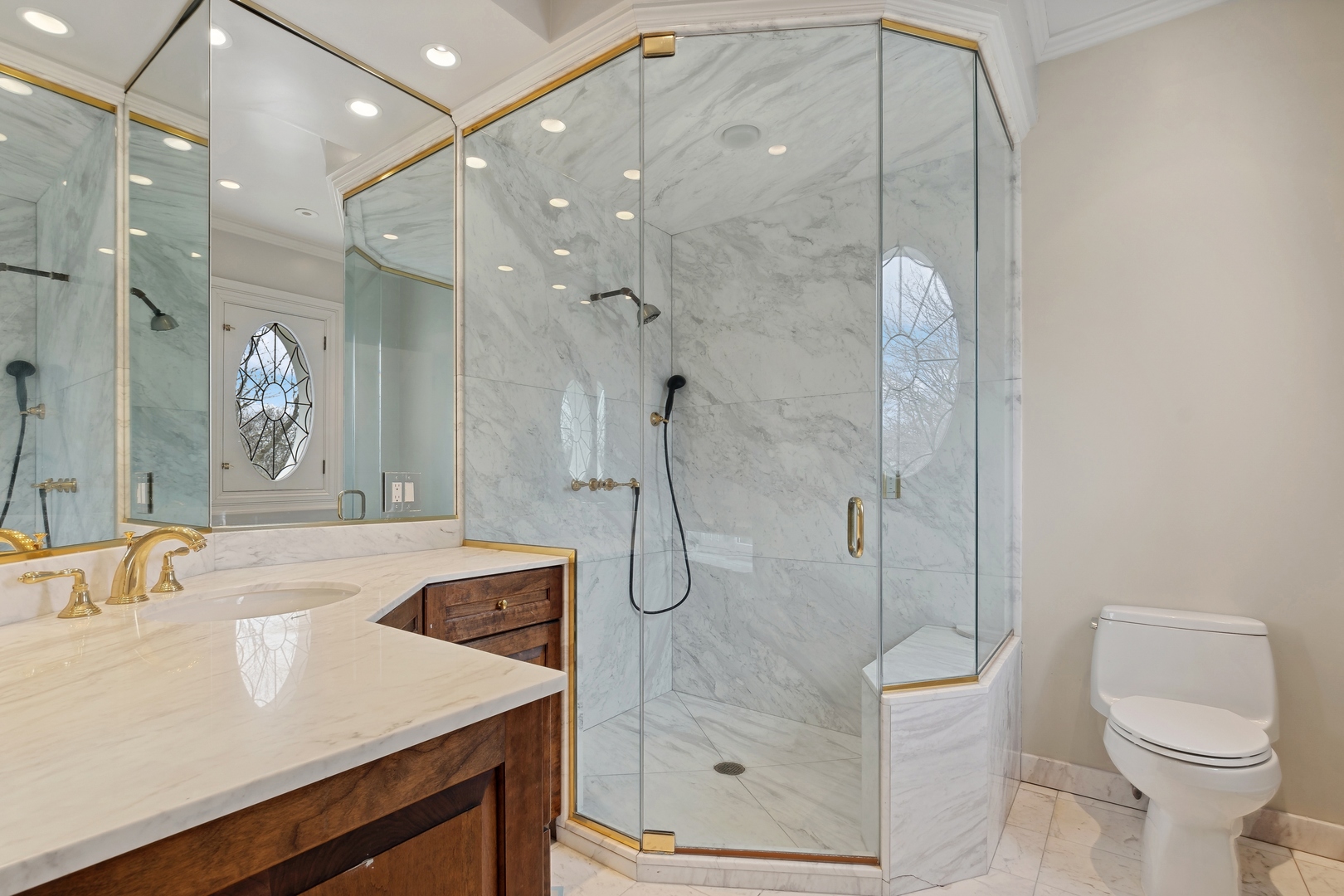 100 Pembroke Drive Lake Forest, IL 60045 - Photo 48 of 56 a bathroom with a sink a toilet and shower