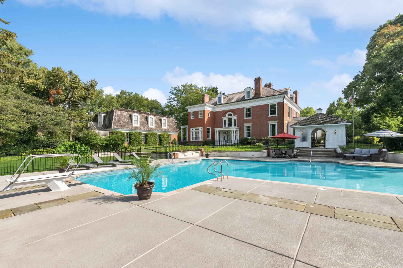 100 Pembroke Drive Lake Forest, IL 60045 - Photo 55 of 56 a front view of a house with fountain and backyard