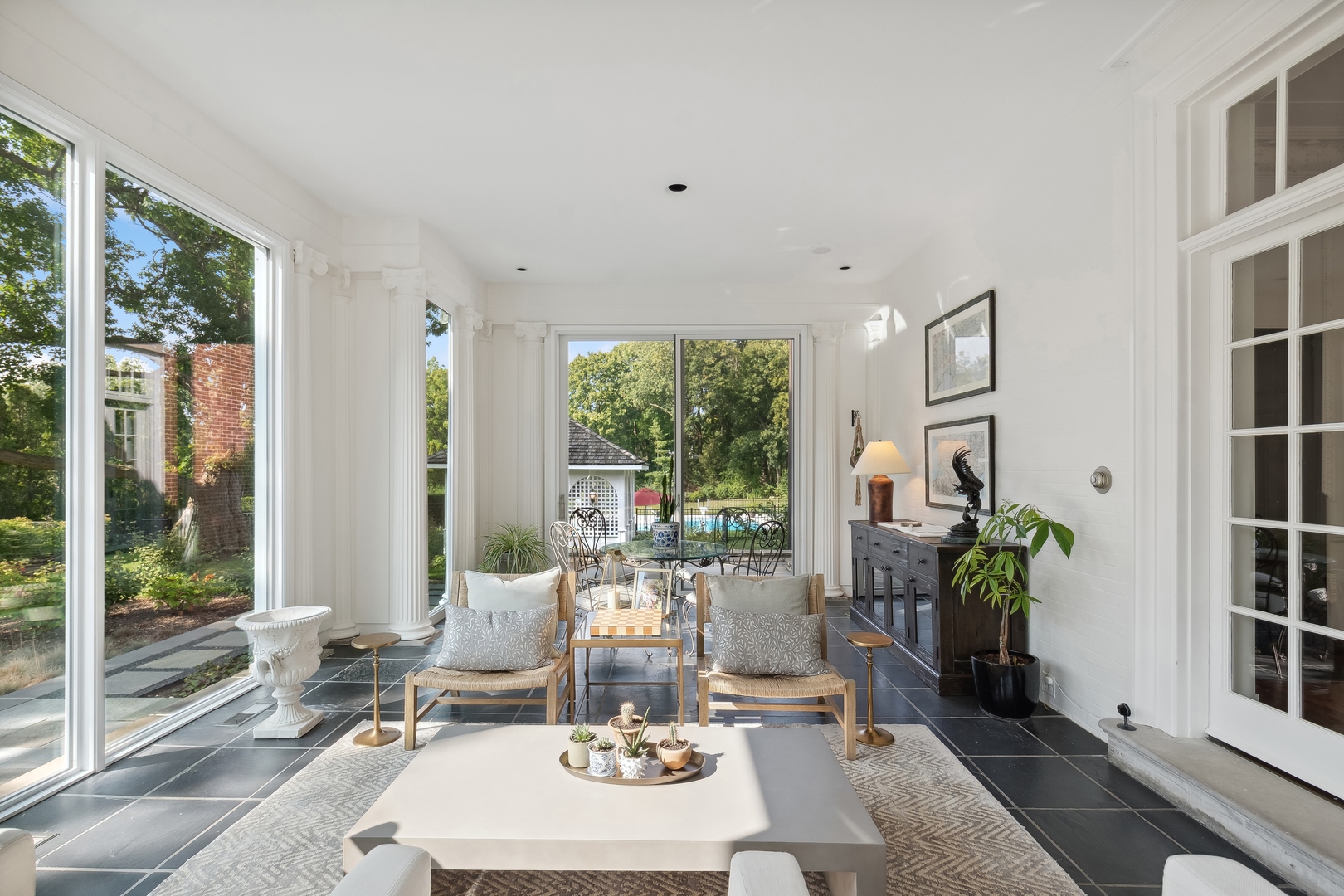 100 Pembroke Drive Lake Forest, IL 60045 - Photo 8 of 56 a living room with furniture and large windows