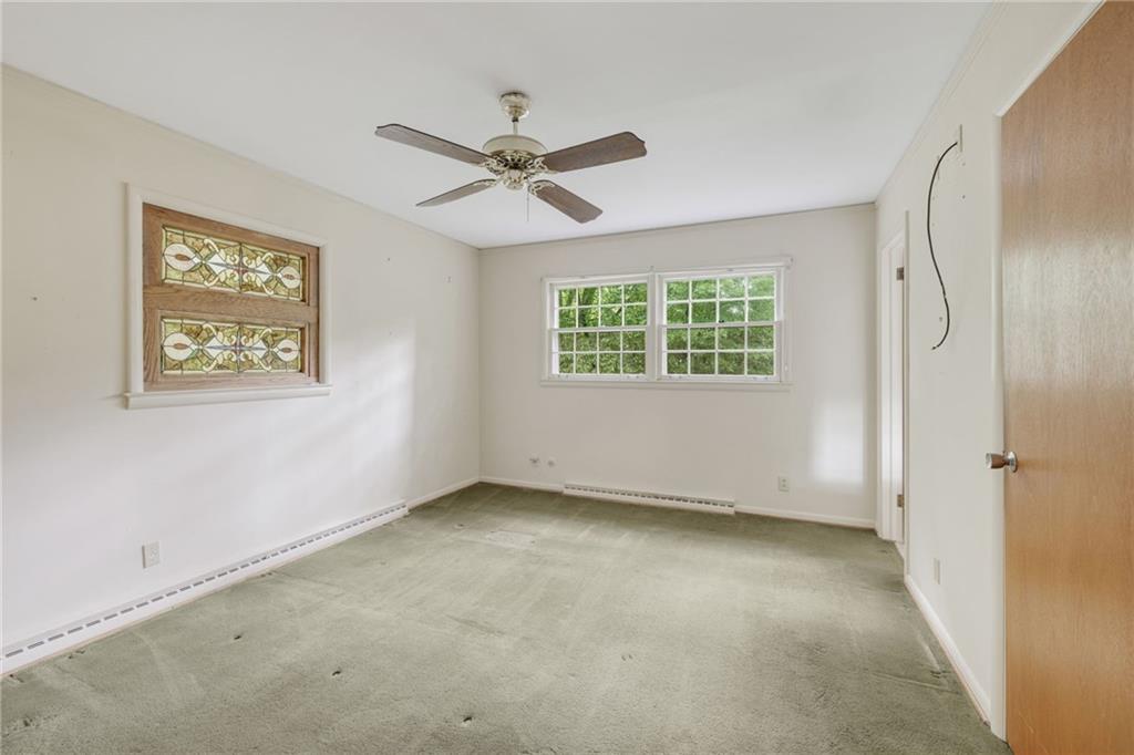 1911 Alderbrook Road Northeast Atlanta, GA 30345 - Photo 27 of 33 a view of an empty room with a window