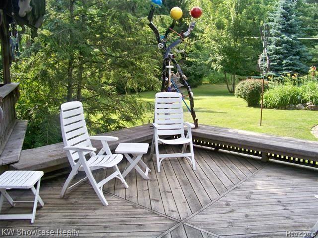 47200 West 11 Mile Road Novi, MI 48374 - Photo 49 of 62 Extensive Deck, Gorgeous Yard/Acreage!