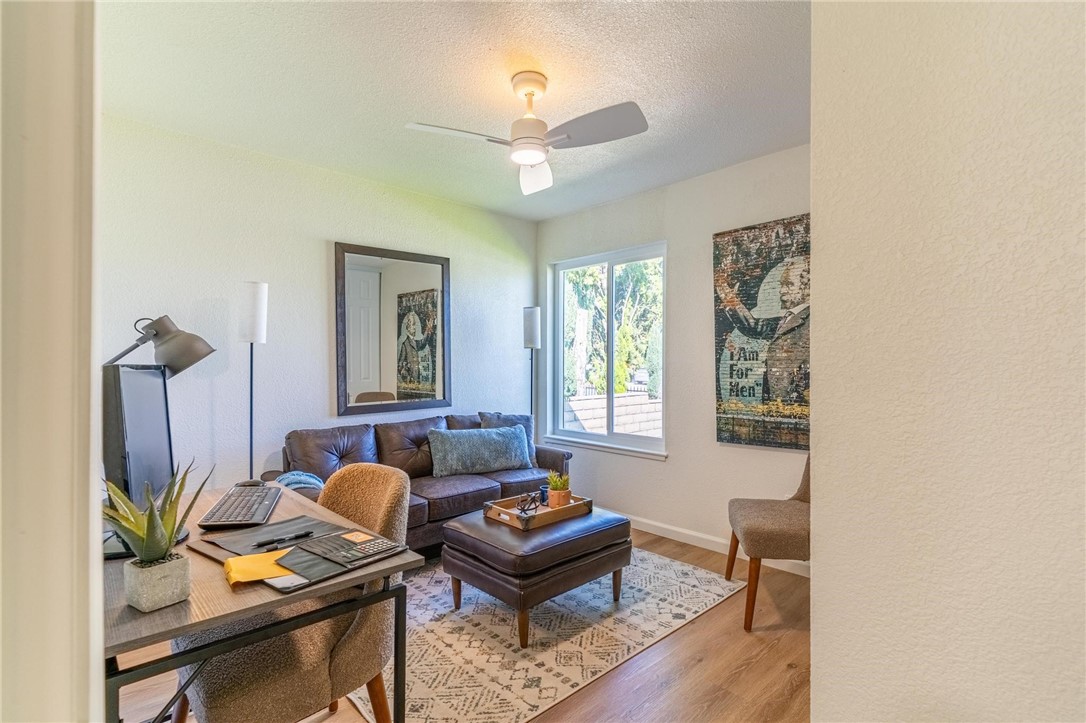 7738 Encinitas Avenue Fontana, CA 92336 - Photo 21 of 35 a living room with furniture and a window